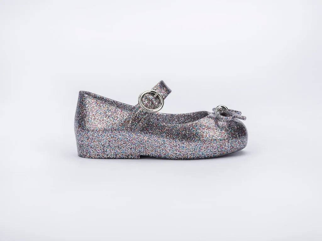 Certainly! Heres an optimized title for your product:

Adorable Baby Girls Silver Glitter Sandals with Bow Applique - Mini Melissa Sweet Love